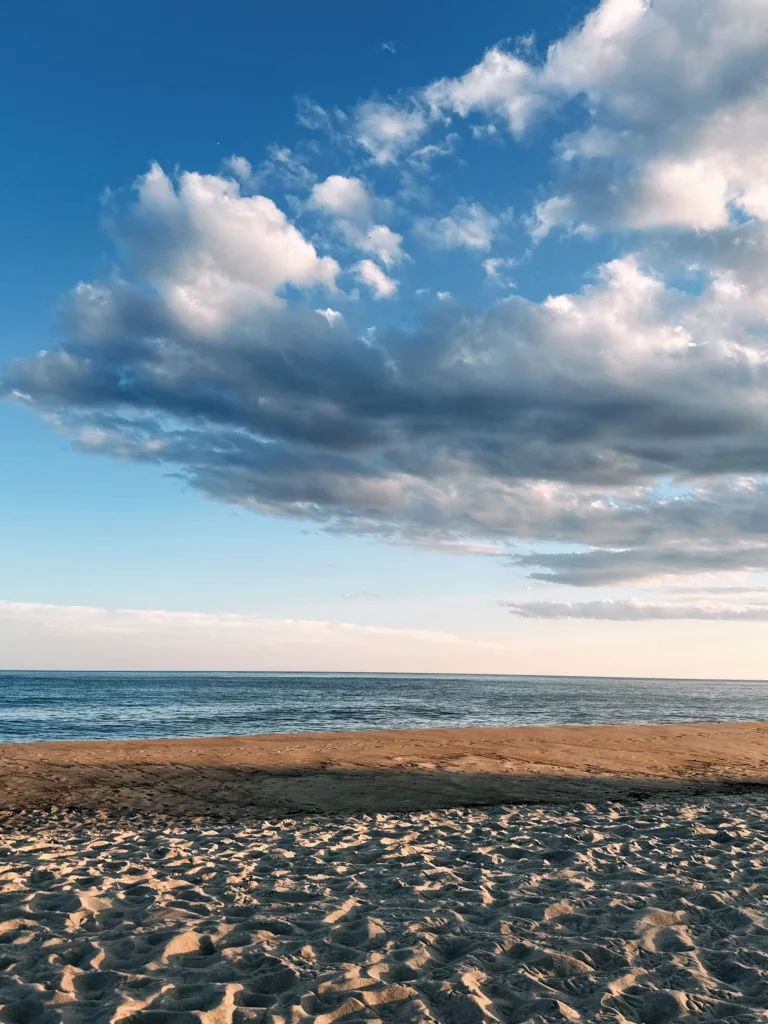 Quiet Montauk beach on Long Island under a dramatic sky